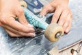 Mounting the wheel pair of skateboarding Royalty Free Stock Photo