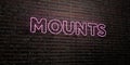 MOUNTS -Realistic Neon Sign on Brick Wall background - 3D rendered royalty free stock image
