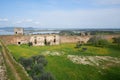 Mourao castle towers and wall historic building with interior garden with alqueva dam reservoir in Alentejo, Portugal Royalty Free Stock Photo