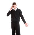 Mournful businessman talking on the phone