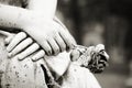 Statue Hands Holding a Rose