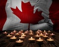 Mourning candles burning on Canada national flag of background. Memorial weekend, patriot veterans day, National Day of Service