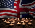 Mourning candles burning on USA and great britain flags of background. Memorial weekend, patriot veterans day, National Day of