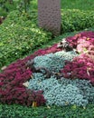 Mourning grave with sedum perennials in autumn