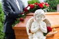 Mourning man at Funeral with coffin Royalty Free Stock Photo