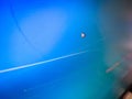 A mouse cursor arrow on a blue computer screen