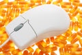 Mouse with pill background Royalty Free Stock Photo
