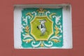 The mouse plays the accordion. Tiled floor in the design of the Palace of the Mouse close up. Myshkin