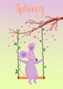 the mouse sits on a swing under a tree with flowers