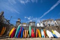Mousehole beach and village with colourful kayaks