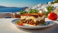 Moussaka on the table against the background of the sea dinner elegant traditional Royalty Free Stock Photo