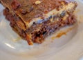 Moussakas, gourmet Greek traditional dish with minced meat, eggplants, potatoes and bÃ©chamel, baked in the oven.