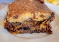 Moussakas, gourmet Greek traditional dish with minced meat, eggplants, potatoes and bÃ©chamel, baked in the oven.