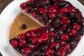 Mousse cake with berries on wooden background Royalty Free Stock Photo