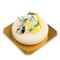 Mousse cake decorated fondant figure of a fallen skier woman