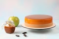 Mousse cake with ingredients-caramel, tonka beans and green apple Royalty Free Stock Photo