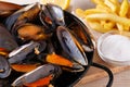 Moussels and french fries or molues-frites. Royalty Free Stock Photo