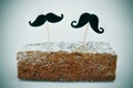 Moustaches in a cake Royalty Free Stock Photo