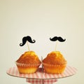 Moustaches in cupcakes, with a retro effect Royalty Free Stock Photo
