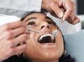 Mouth, face of woman and dentist with tools for dental, healthcare, assessment and test in clinic. Oral wellness Royalty Free Stock Photo