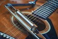Mouth harmonica resting on acoustic guitar Royalty Free Stock Photo