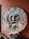 Mouth of Truth  Bocca della Verita marble mask in the Santa Maria in Cosmedin  basilica church in Rome. Royalty Free Stock Photo