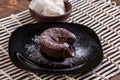 Mouth watering delicious chocolate fondant cake, restaurant serving. Royalty Free Stock Photo