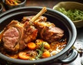 Mouth-watering lamb shoulder roast with apricots carrots onions and thyme in cast Dutch oven. Traditional African Moroccan cuisine