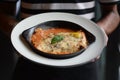 Mouth watering semi saucy melanzane alla parmigiana aubergine parmigiana in a pan