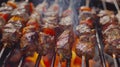 Mouth-watering skewers of grilled meat and vegetables glisten over an open flame, epitomizing the flavor and enjoyment of outdoor Royalty Free Stock Photo