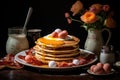 A mouth-watering stack of pancakes topped with perfectly cooked eggs and crispy bacon strips, A morning breakfast with pancakes,