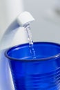 Mouthwash cup in fill with water at dental clinic Royalty Free Stock Photo