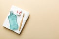 Mouthwash and other oral hygiene products on colored table top view with copy space. Flat lay. Dental hygiene. Oral care Royalty Free Stock Photo