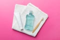 Mouthwash and other oral hygiene products on colored table top view with copy space. Flat lay. Dental hygiene. Oral care Royalty Free Stock Photo