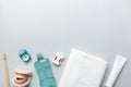 Mouthwash and other oral hygiene products on colored table top view with copy space. Flat lay. Dental hygiene. Oral care Royalty Free Stock Photo