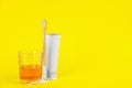 Mouthwash, toothbrush, paste and dental floss pick on yellow background, space for text Royalty Free Stock Photo