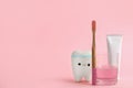 Mouthwash, toothbrush, paste and holder on pink background. Space for text Royalty Free Stock Photo