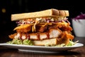 mouthwatering close-up of a club sandwich layered with crispy chicken tenders, tangy coleslaw, and sweet barbecue sauce Royalty Free Stock Photo