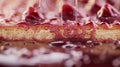 a mouthwatering close-up shot of a slice of freshly baked cake dripping with decadent jam ganache