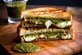 Mouthwatering Grilled Cheese With Gooey Mozzarella And Tangy Pesto. Generative AI