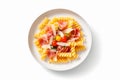 Mouthwatering Pasta Perfection: Top-Down View of a Dish with Beautifully Arranged Sliced Ham on White Background