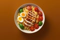Mouthwatering and rustic food composition showcasing delightful bowl filled with grilled chicken, succulent tomatoes, bo