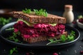 A mouthwatering sandwich topped with beets and fresh greens, served on a sleek black plate, Vegan sandwiches with beetroot hummus