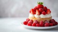 A mouthwatering strawberry shortcake adorned with fresh berries, set against a clean Royalty Free Stock Photo