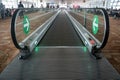 Movable conveyor belts at the airport, straight flat escalator