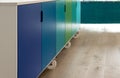 Movable kitchen island on industrial castor wheels, retro design, painted in blue and green ombre colours