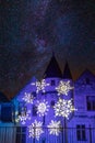 Movable laser projections on a festive Christmas theme on the facade of the interactive public space is located Royalty Free Stock Photo