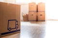 Move. Cardboard, boxes for moving into a new, clean and bright home Royalty Free Stock Photo