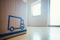 Move. Cardboard, boxes for moving into a new, clean and bright home. Clean and sunny room