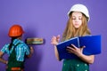 Move in new apartment. Children sisters run renovation their room. Amateur renovation. Sisters team renovating home Royalty Free Stock Photo